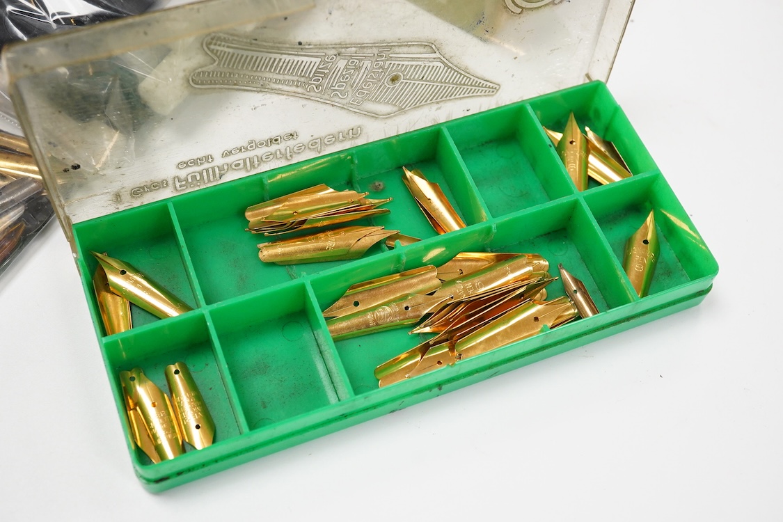 A large collection of fountain pen gold plated nibs / sections from various makers